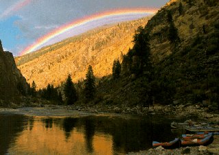 A rainbow shimmers over the Middle Fork River.