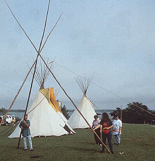 Participants help construct their own lodging.