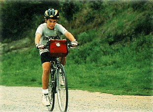 A child enjoys a ride through France.