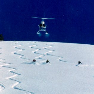 Heli-skiers run the powder.