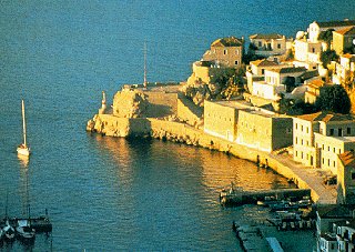 Approaching a port on the azure Aegean.