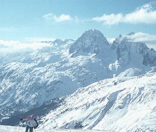 A skier on the Alpine slopes.