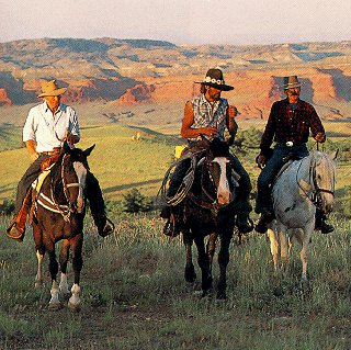 Riders follow the Outlaw Trail.