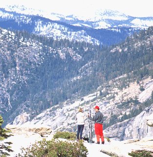 Skiers pause in the California Sierras.