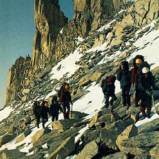 Hikers traverse a slope in California.