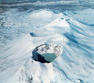 Fly over dormant craters on Kamchatka.