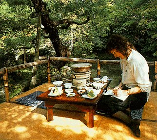 A visitor writes at Yudofu Restaurant in Kyoto.