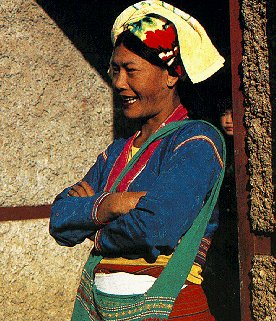 A Burmese woman in colorful costume.