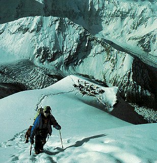 A climber leaves Camp 3 on Korzhenevsky.