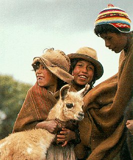 Peruvian children and their pet llama.