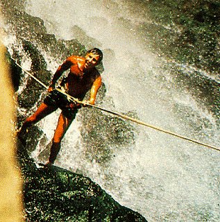 Rappeling beside an Israeli waterfall.