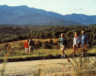 Hikers enjoy the New England terrain.