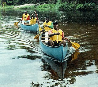 Canoeing and camping in the wilderness.